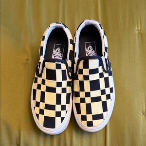Vans Black and Cream Checkerboard Slip-On Sneakers
